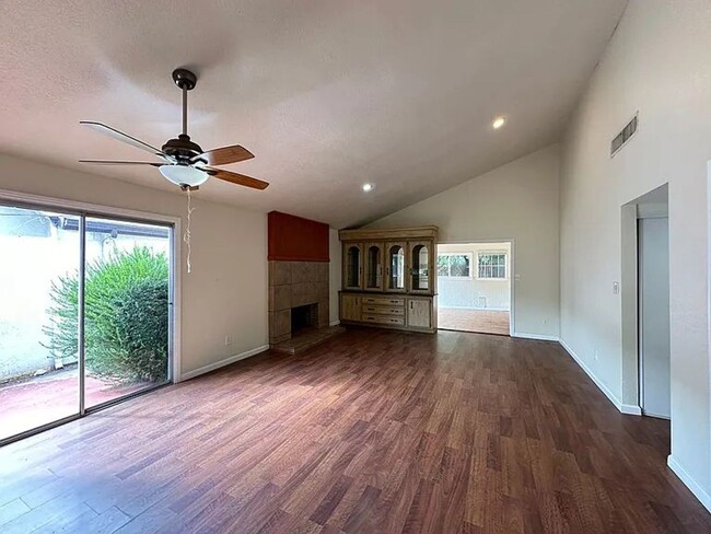 Building Photo - The entire home has new laminate flooring ...