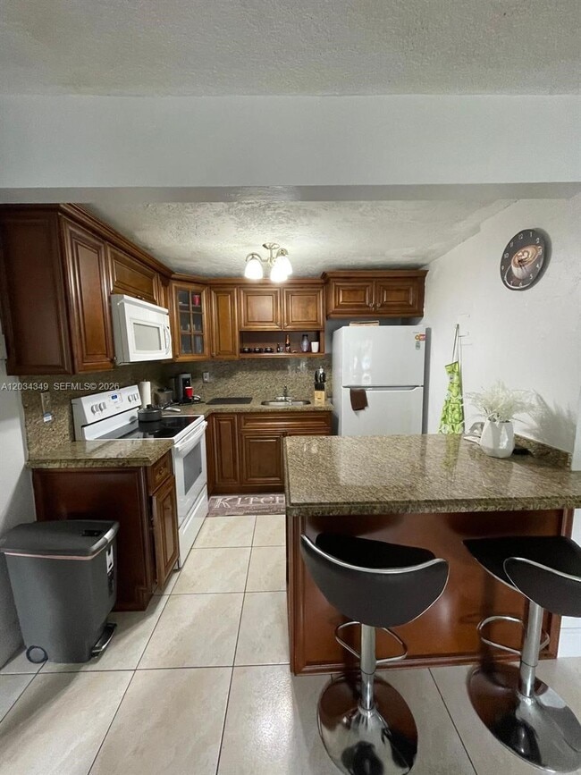 Building Photo - 4275 NW S Tamiami Canal Dr