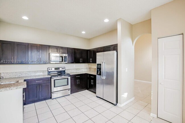 Building Photo - 7580 Belmonte Blvd