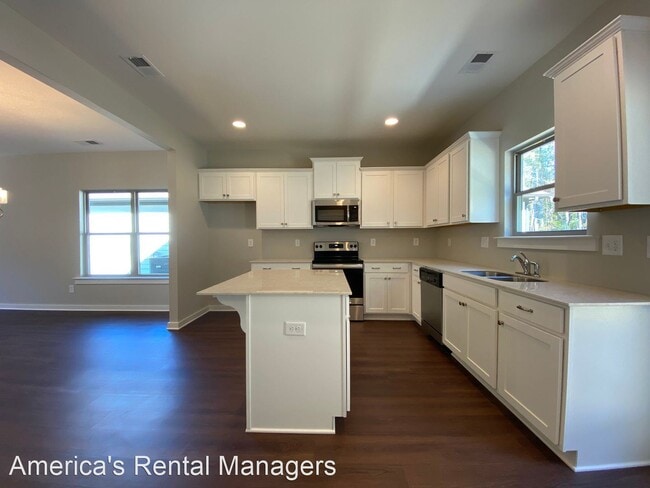 Building Photo - 4 br, 2.5 bath House - 7937 St. James Drive
