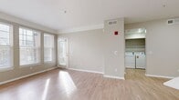 This 610 square foot apartment in Aurora, CO offers a thoughtfully designed living space with modern amenities. The open-concept layout seamlessly blends the living room and kitchen, creating an airy atmosphere enhanced by large windows that flood the space with natural light. The kitchen boasts a contemporary design with white cabinetry, stainless steel appliances, and a stylish hexagonal tile backsplash. A central island provides additional counter space and casual dining options.

The bedroom, measuring 130 square feet, features plush carpeting and ample closet space. The bathroom is outfitted with a tub-shower combination and wood-look flooring that complements the overall design aesthetic. In-unit laundry facilities add convenience to daily living.

Throughout the apartment, neutral tones create a calming ambiance, while the light wood-look flooring in the main living areas adds warmth and durability. The property's attention to detail is evident in the crisp baseboards, modern light fixtures, and updated hardware.

This single-floor dwelling maximizes its 610 square feet, offering a harmonious blend of style and functionality. Its location at 17201 E Walsh Way in Aurora provides residents with a comfortable home base in a desirable Colorado setting.