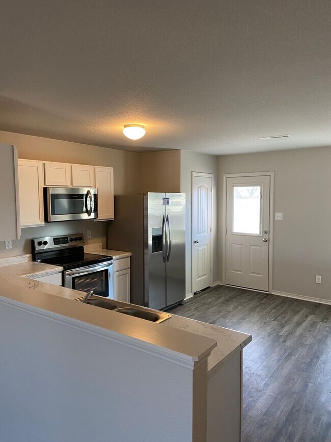 Building Photo - *Pre-leasing* Four Bedroom | Two Bath Home...