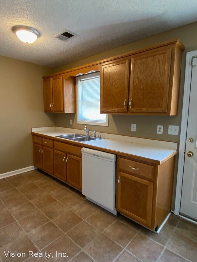 Building Photo - 3 br, 2 bath House - 1009 Shadow Ridge