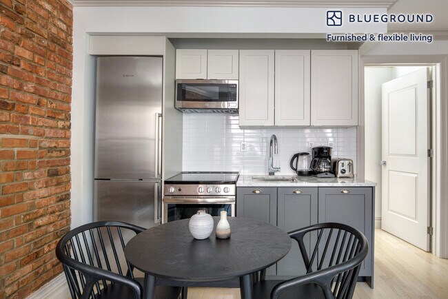 Foto del edificio - 161 W 4th St