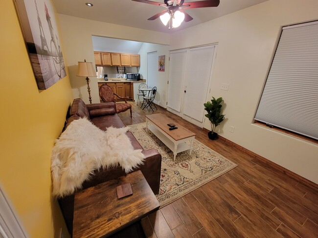 View of the living room from the wall beside the TV. - 1519 5th St NW