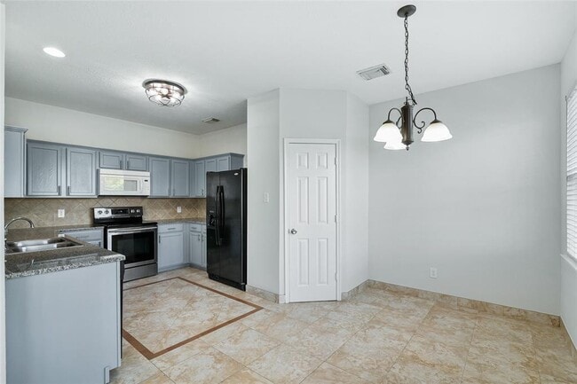 Building Photo - 7554 Oakwood Canyon Dr
