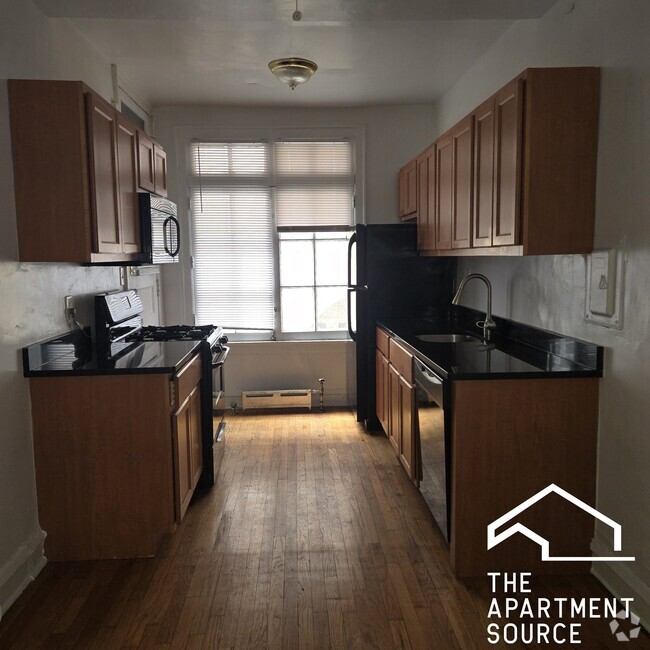 Building Photo - 948 W Cuyler Ave