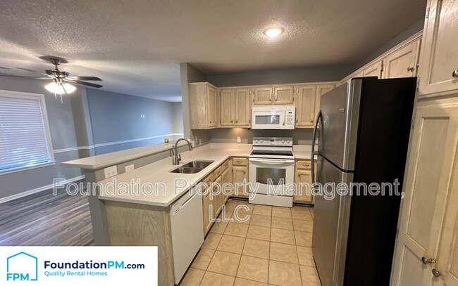 Foto del edificio - 8230 Town N Country Dr