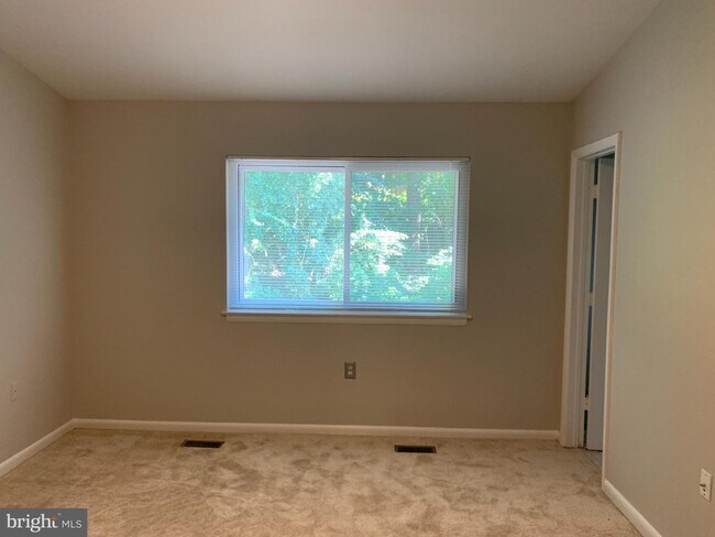 Building Photo - 8103 Greenspring Way
