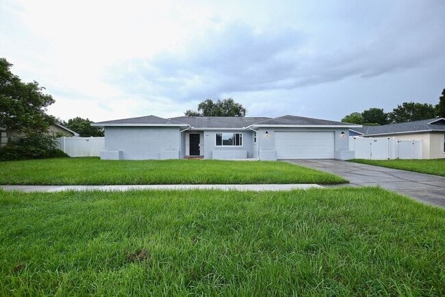 Building Photo - Gorgeous 4/2 Pool Home with a Covered Patio and a Large Fenced Backyard Located in Dr. Phillip's ...