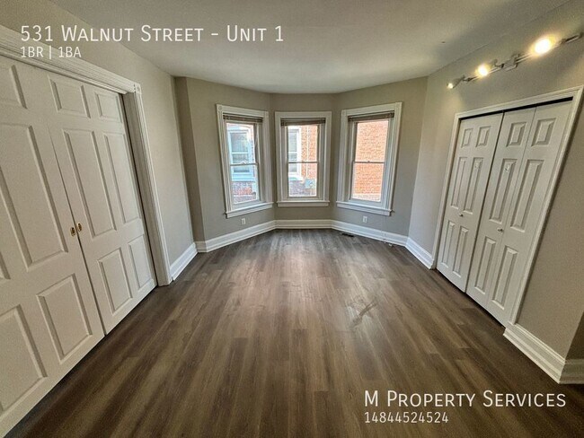 Building Photo - Charming Renovated 1-Bedroom First floor T...