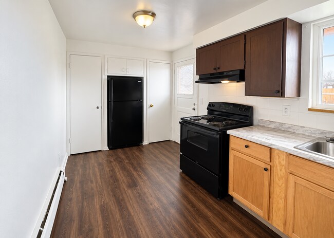 Photo - Cozy 1-Bedroom Retreat with 750 Sq Ft of Comfort in Denver's Heart – 4683 W Tennessee Ave Awaits! Apartment