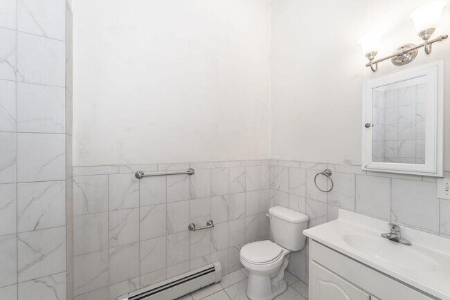 Foto del edificio - 411 John F. Kennedy Blvd