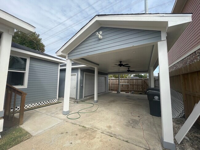 Covered carport w/ ceiling fans - 165 Woodvale St