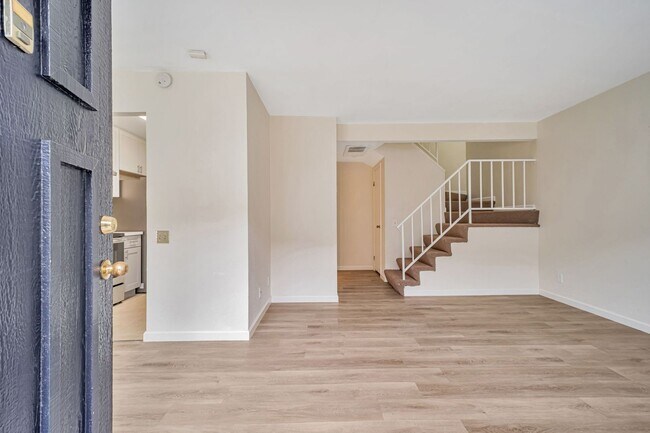 Building Photo - 2-story condo featuring 2 bedrooms and 1.5...