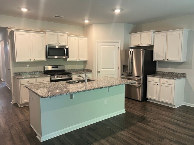 Building Photo - Pet-Friendly, Four-Bedroom, Two-Bath Home ...