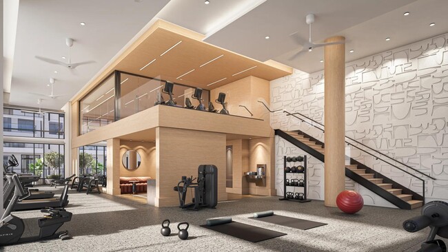 Estudio de fitness con calidad de club, con bicicletas de spinning, sistema TRX y estudio de yoga/pilates. - Modera Reserve