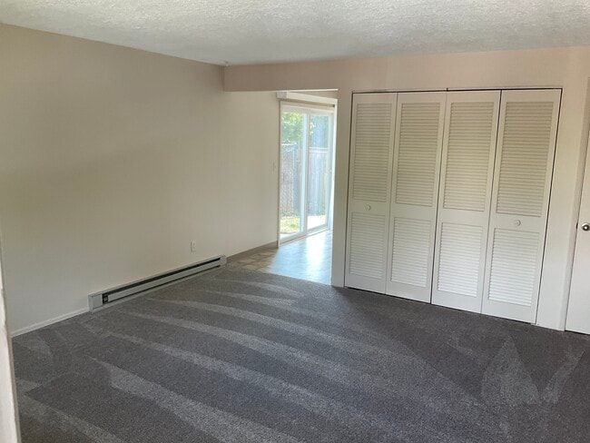 Living area to kitchen - 434 S Idaho St