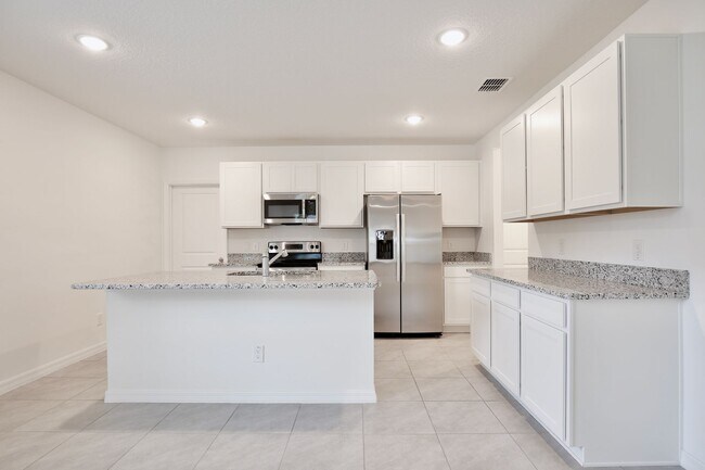 Building Photo - Stunning 3/2.5 Modern Townhome with a Loft...