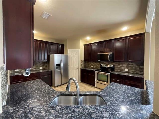 Foto del edificio - 6020 Heather Dr