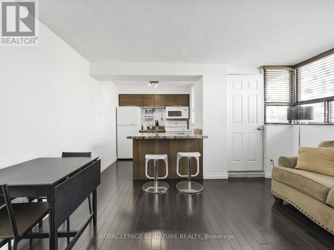 Building Photo - 105-105 McCaul St