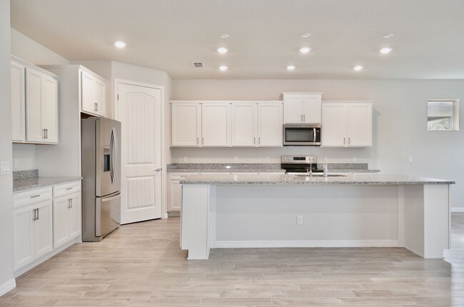 Building Photo - Gorgeous 3/3 Modern Home with a Bonus Room...