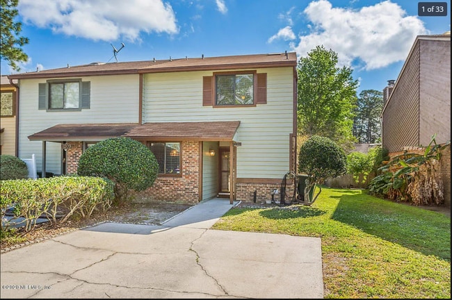 Building Photo - 11211 Windtree Dr