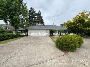 Building Photo - 4469 SE Pennywood Dr