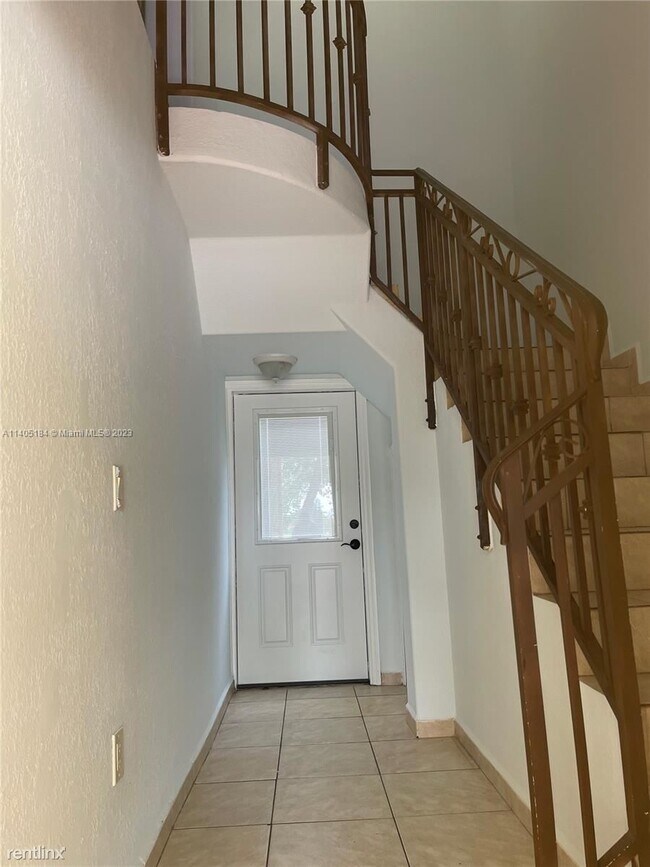 Building Photo - 3 br, 2.5 bath House - 7380 NW 174th Ter A...