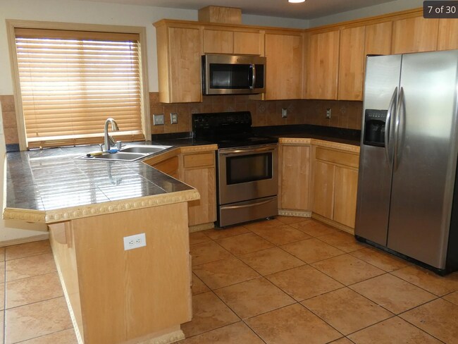 Building Photo - Spacious 4 BR/ 2.5BA