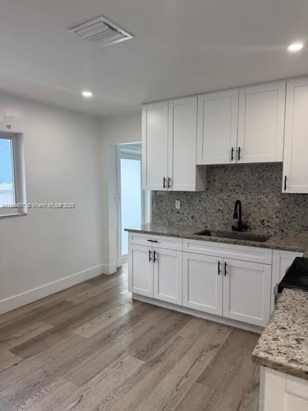 Foto principal - 108 E 8th St