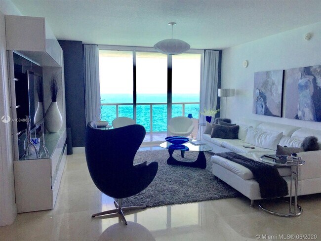 Building Photo - 16699 Collins Ave