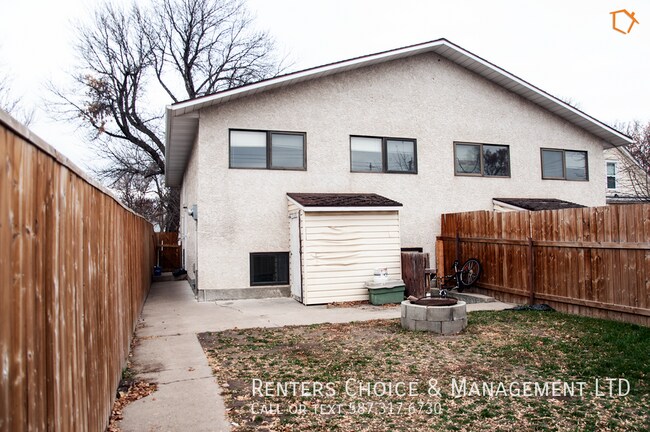 Photo du bâtiment - Quick Walk to Work or School from this North Lethbridge Half Duplex