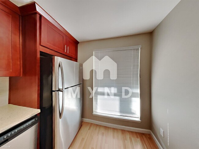 Building Photo - 3 br, 2 bath Condo - 1606 103rd Place Nort...