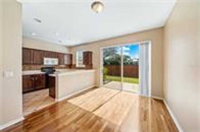 Foto del edificio - Luxury Lake Nona Townhome in Gated Community | 3BR + Garage + Resort-Style Amenities