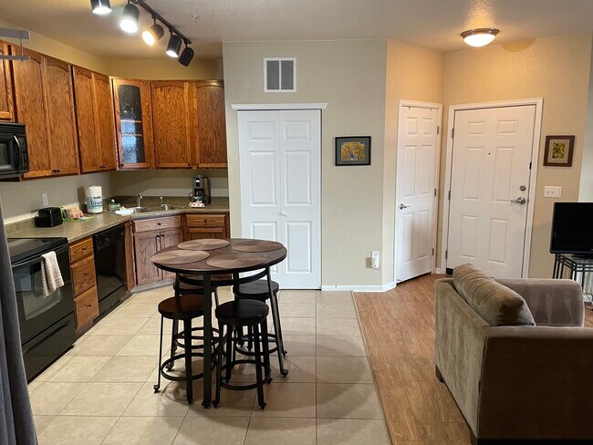 Stackable W/D behind door on the left - 3854 S Dayton Way