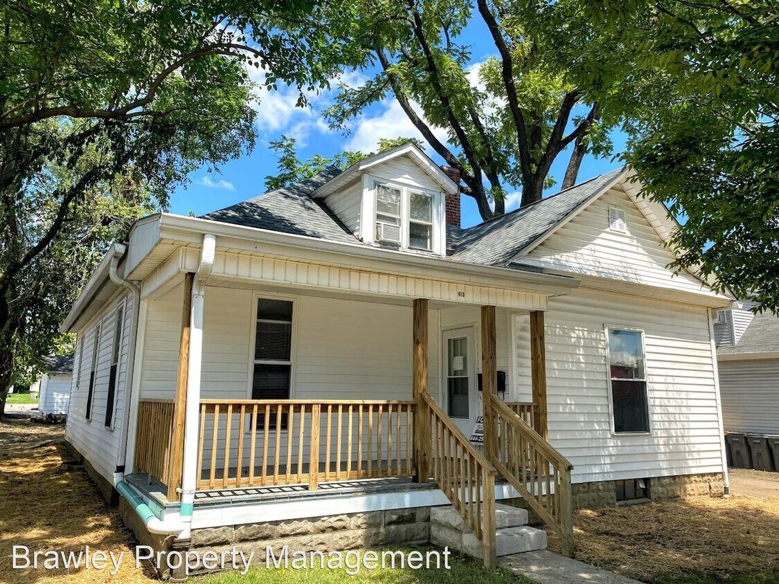 Foto principal - 6 br, 2 bath House - 413 E. 10th St