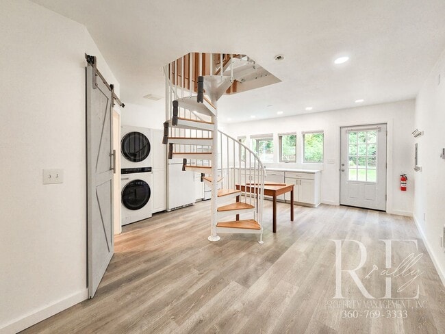 Building Photo - Charming Tudor Loft with Spiral Staircase & Waterfront Access