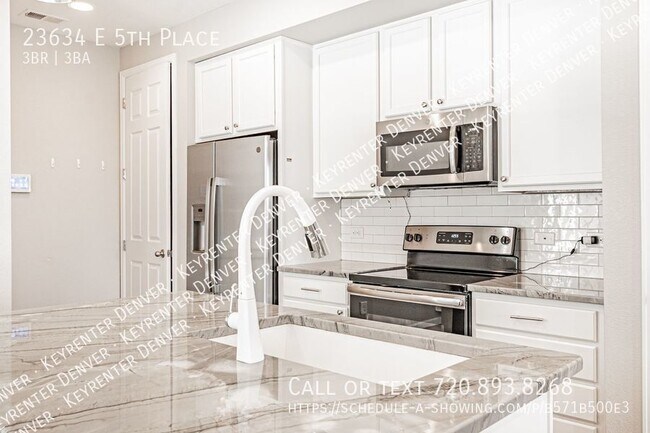 Building Photo - Luxury Living in Aurora: Your Dream Townho...