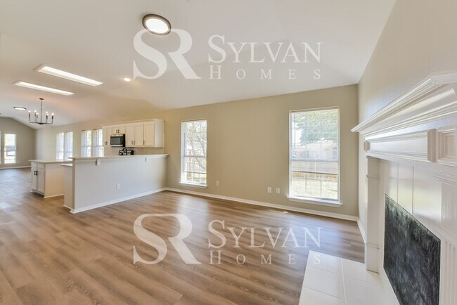 Building Photo - Updated 4 bedroom home with garage!