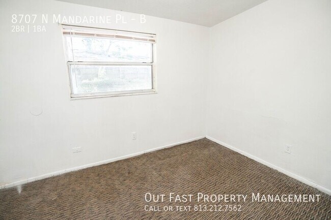 Building Photo - 8707 N Mandarine Pl