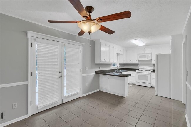 Building Photo - 4899 Raven Way NE