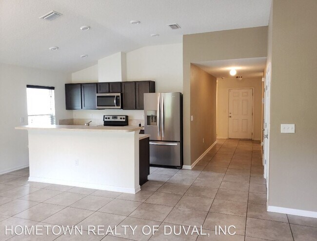 Building Photo - 4 br, 2 bath House - 7634 Fanning Dr.
