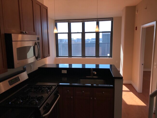 View of dining/living room from kitchen - 2120 Vermont Ave NW