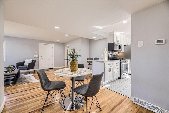 Building Photo - "Charming 3-Bed SFH Denver Gem with Gleaming Hardwood Floors"