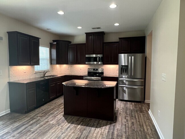 Building Photo - Bright-Sunny 4 Bedroom, 2.5 Bathroom Home ...