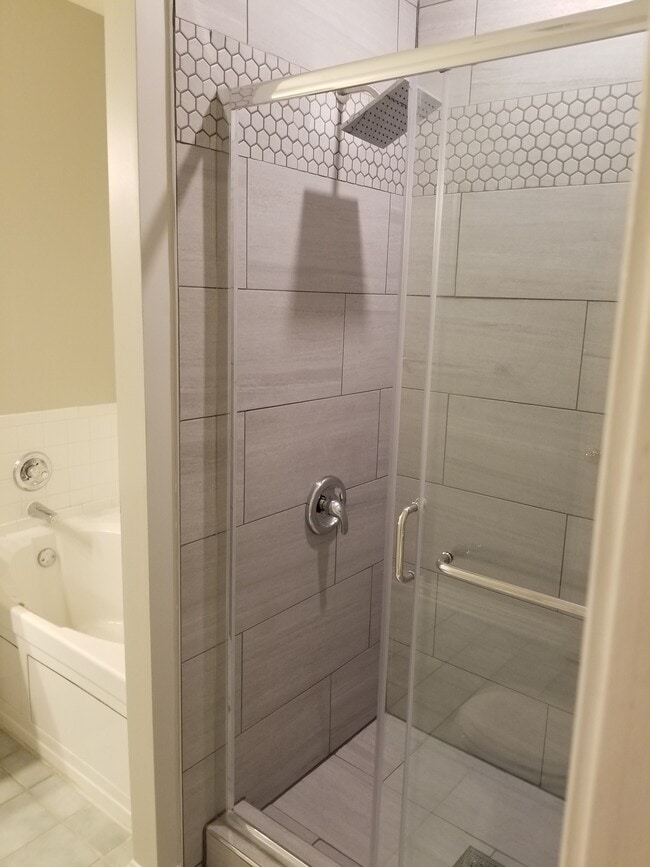 Updated master bath. New tile, waterfall shower head - 2720 Bellforest Ct