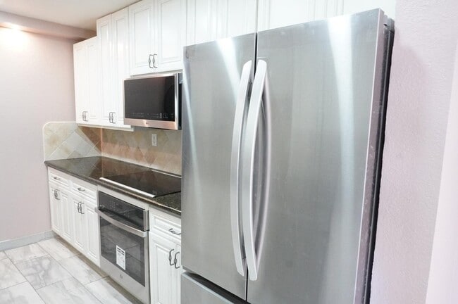 Photo - 10444 N 69th Street Unit 107 Apartment