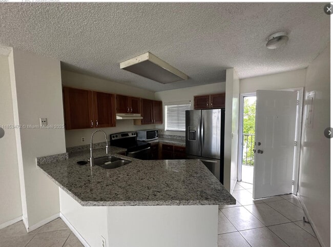 Building Photo - 8710 N Sherman Cir