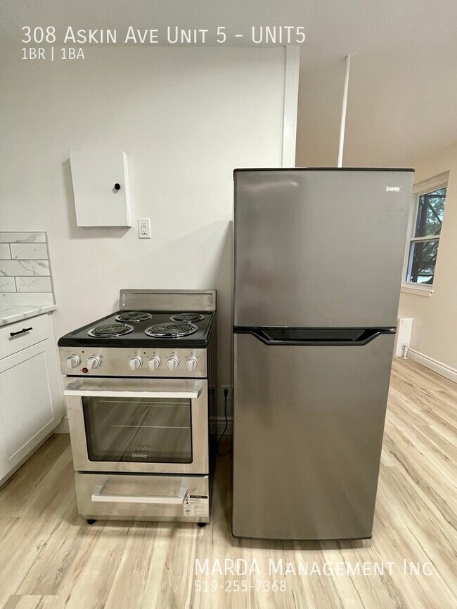 Photo du bâtiment - ENJOY TWO MONTHS FREE RENT!!COZY 1-BEDROOM...